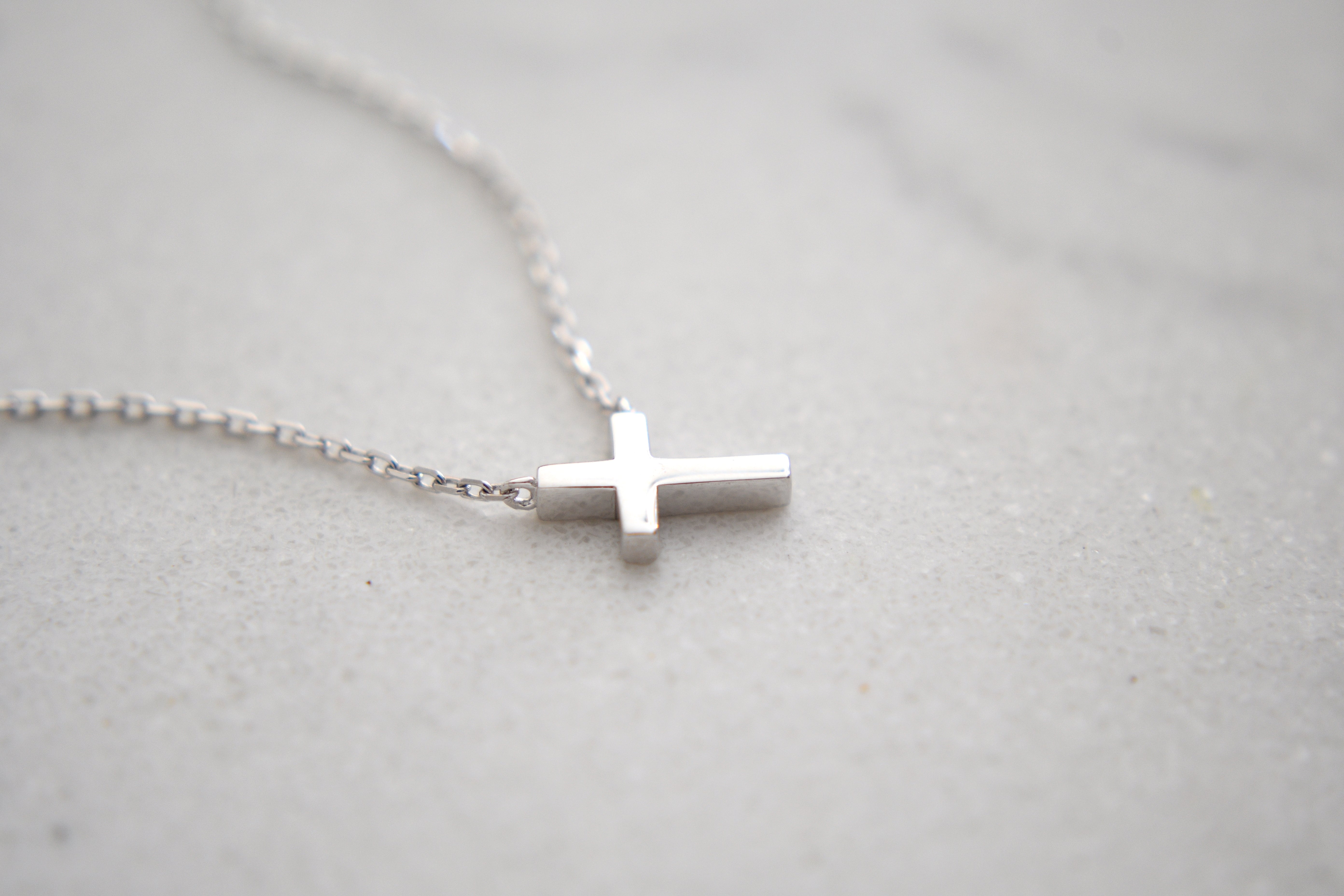 Jair Leaning Cross Necklace in White Gold Plating