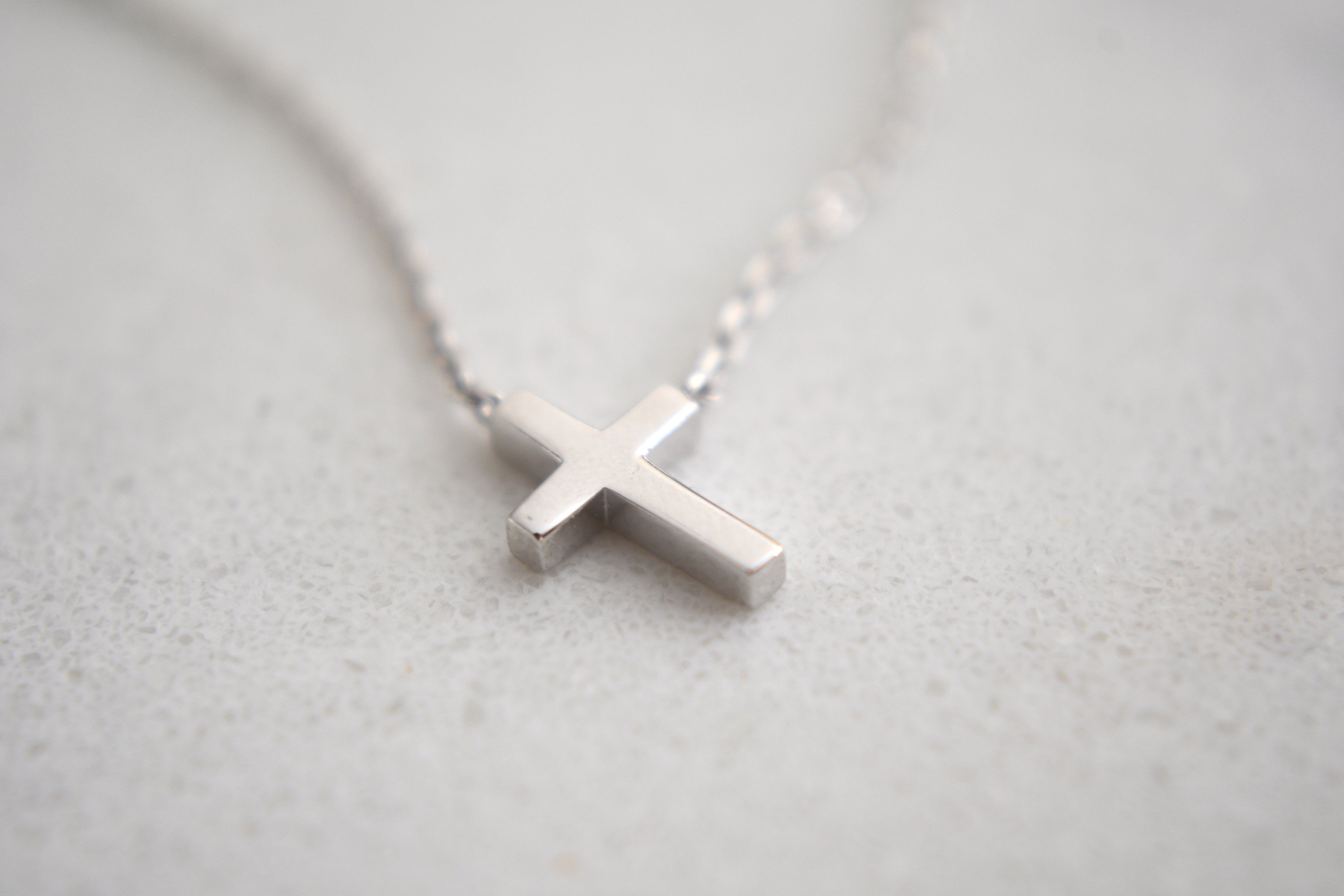Jair Leaning Cross Necklace in White Gold Plating